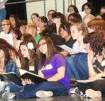 Young Women Learning to Sing